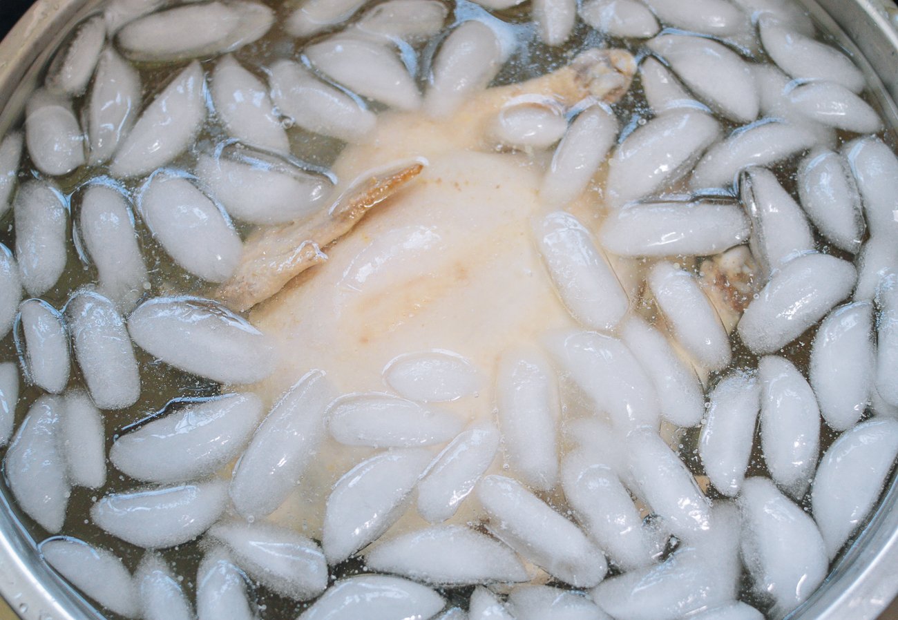 poached whole chicken in ice bath