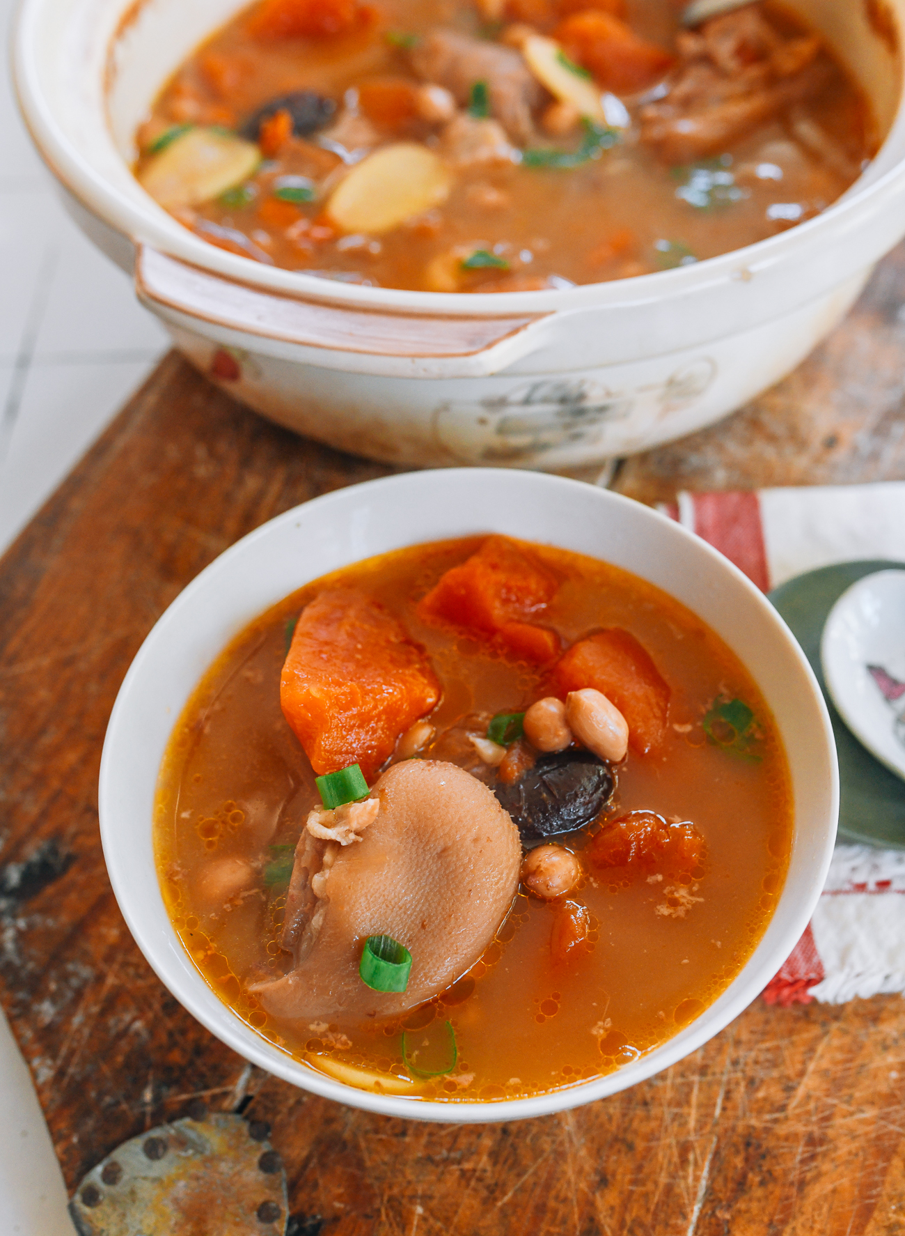 Chinese papaya soup with pig feet, ginger, peanuts, dates, and goji berries